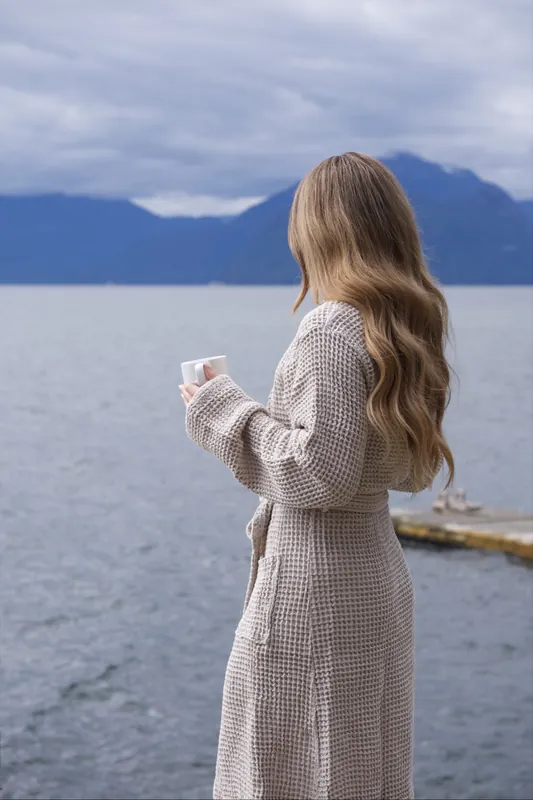 Lifestyle photo of a woman by the water